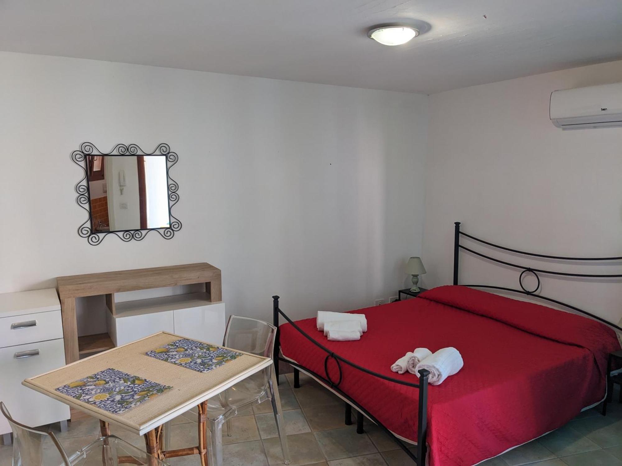 Residenze Il Girasole Aparthotel Golfo Aranci Bilik gambar